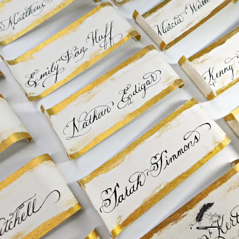 Wedding Place Cards — Hand Calligraphy Hand-calligraphed wedding place cards on watercolor paper with gilded edges
